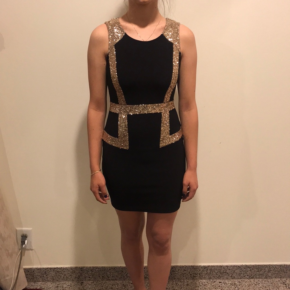 Mini short black dress with gold sequin accents